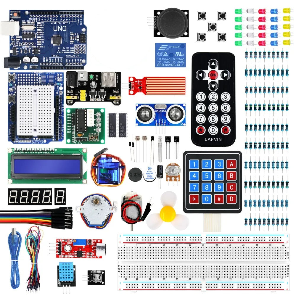 Collection of electronic components and boards on a white background