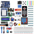 Collection of electronic components and boards on a white background